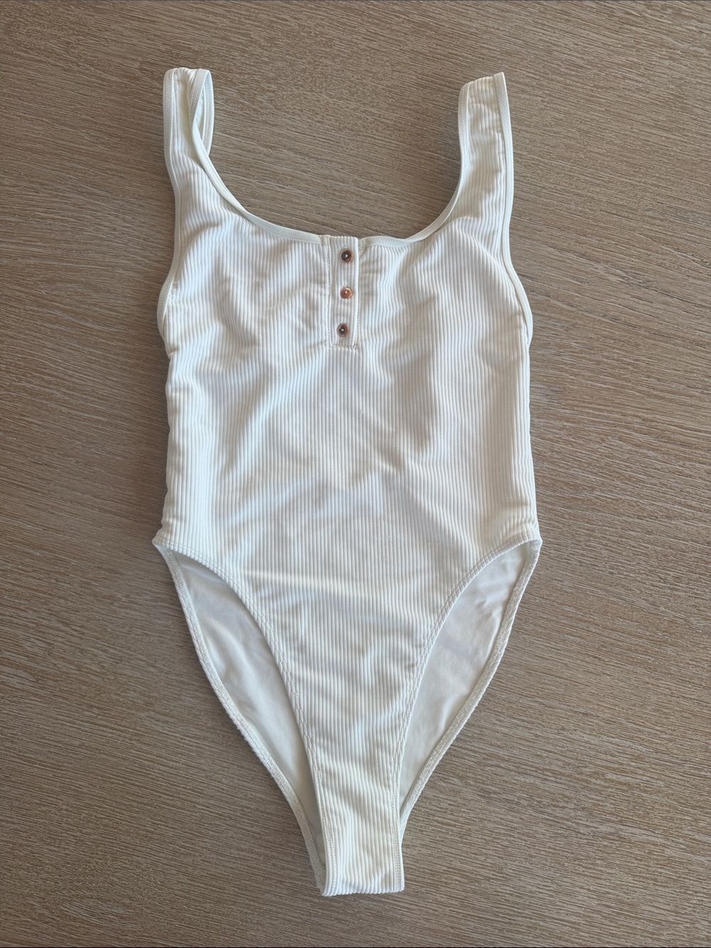 Frankie’s Bikinis Ribbed White One-Piece Bodysuit with Button Detail